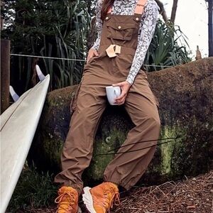 Free People Dark Olive Green Overalls with wide peach straps